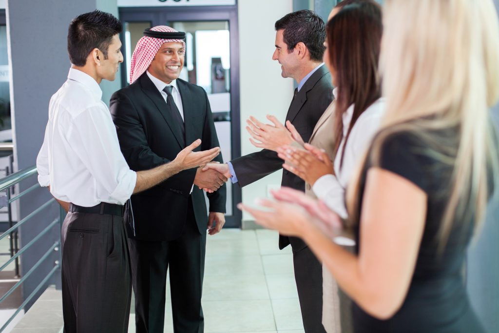 Translator introducing arabian businessman